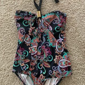 Tara Grinna one-piece swimsuit.